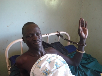 Accused_child_killer_Madal_Majok_chained_to_a_hospital_bed_in_August_2009_photo_by_M-_Mayom_ST_.jpg