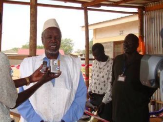 Dr. Luka Monoja talking to the media at the Voter Registration Center in Kator, Juba after registering himself, on Nov 10, 2009 (photo by Larco Lomayat)