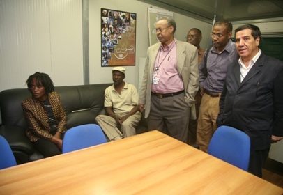 From left to right, two released hostages Pamela and Patrick (sitting down), Deputy JSR, Mohamed Yonnis,who was leading UNAMID efforts to secure  the release of the two hostages next to him   UNAMID Spokesperson Noureddine Mezni and other senior members during the welcoming reception in UNAMID Zalengei Camp on 13 December,2009 (photo by Albert-Gonzalez-UNAMID)