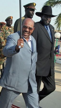 A picture taken on January 9, 2009 shows Sudan's President Omar Al-Bashir (C) and First Vice President Salva Kiir arriving at Upper-Nile State capital city (Getty)