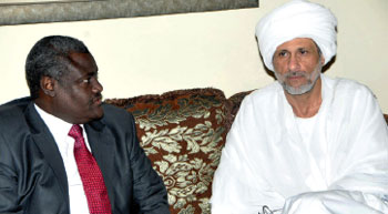 Chad's Foreign Minister Moussa Faki Mahmat (L) and sudanese Presidential Advisor Ghazi Salah Al-Deen