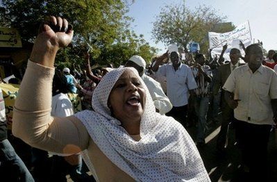 A Sudanese opposition supporter shouts slogans during a protest against the government in Khartoum on December 7. (AFP)