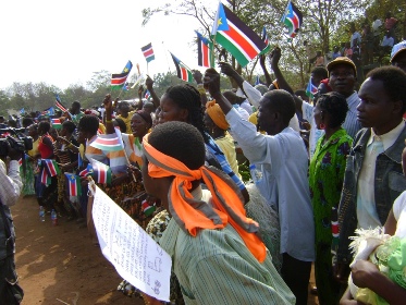 SPLM supporters in Anzra waving SPLM flag when South Sudan leader Salva Kiir visited Western Equtoria for peace celebration on Jan. 19, 2010. The party's popularity in villages is being tested by candidates’ nomination (Photo by Philip Thon Aleu -- ST)
