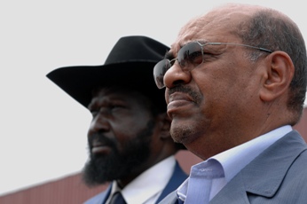 Sudanese president Omer Hassan Al-Bashir (R) and First Vice president Salva Kiir in Yambio, January 19, 2010 (Photo by Tim Mckulka - UNMIS)