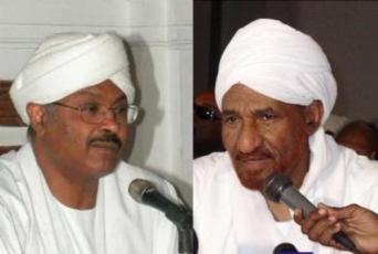 Umma Party leader Al-Sadiq Al-Mahdi (right) and the head of the Umma Renewal and Reform Party Mubarak Al-Fadil (left)