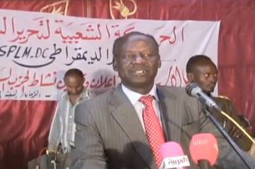 Akol addressing a political meeting