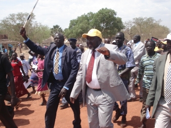 Chol Tong (front right) and Daniel Ayual Makoi (waving stick) who had made a failed bid for the SPLM gubernatorial nomination (photo by Manyang Mayom - ST)