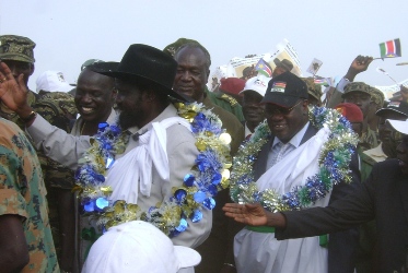 Salva Kiir Mayardit (L) and Riek Machar Teny on arrival to Bor airstrip, on March 12, 2010 (by Philip Thon Aleu - ST).
