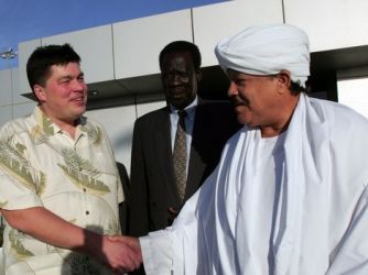 Russian envoy Mikhail Margelov received by a Sudanese foreign ministry protocol chief at Khartoum Airport on January 24, 2009.  (Getty images)