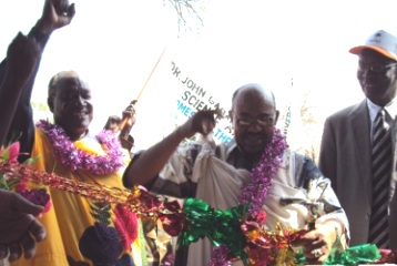 President Omer Bashir (C) officially opens Dr. John Garang Memorial University of Science and Technology in Bor as Gov. Kuol Manyang (L) and Prof. Agrey Ayuen (R) look-on in happiness on March 17, 2010 (Sudan Tribune photo by Philip Thon Aleu)