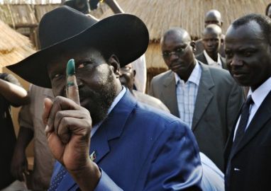 Sudanese Vice President and South Sudan leader Salva Kiir shows his ink-stained finger at a polling station in the southern capital of Juba on April 11, 2010. (Getty)