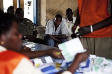 Southern Sudanese election observers and political party agents witness the start of ballot counting in Juba , Friday, April 16, 2010 (AP)