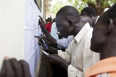 Southern Sudanese line up to vote at a polling station in Juba, on Sunday April 11, 2010. (AP)