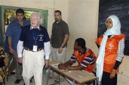 Former U.S. President Jimmy Carter observes a polling station in Khartoum, Sunday, April 11, 2010. (AP)