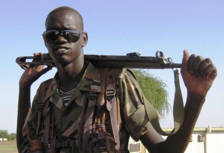 A_Sudan_People_s_Liberation_Army_SPLA_soldier_stands_guard.jpg