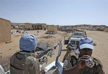 South African soldiers with the United Nations peacekeeping mission patrol the North Darfur village of Kafod in July 2008. (AFP)