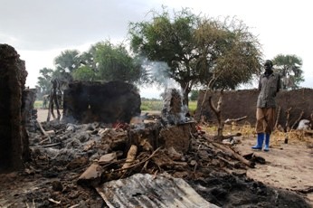 destroyed huts are seen in the southern Sudanese village of Duk-Padiet, which suffered recent fighting, in southern Sudan Tuesday, Sept. 22, 2009.