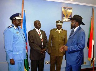 South Sudan President Salva Kiir Mayardit briefs Police bosses as Maj. Gen Gier Aluong (in glasses) looks on (ST)