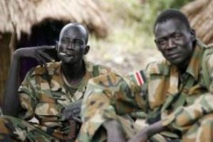 SPLA soldiers smoke