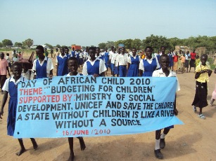 Bor primary school pupils carry a banner on the June 16, 2010 (ST)