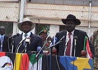 South Sudan's  Salva Kiir (R)and Ugandan Yoweri Museveni as he addresses a news conference in Juba April 14, 2008