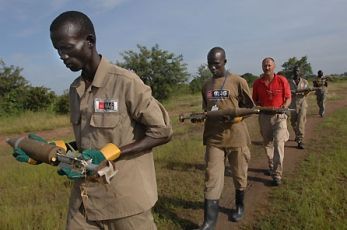 A Mine Action Team in Sudan moves unexploded ordnance before transporting it to demolition site (photo MAG)