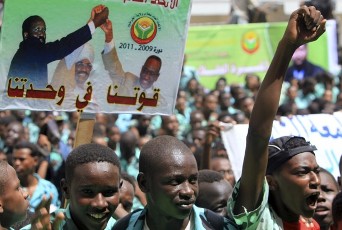 Students rally calling for support for unity between south and north Sudan at the National Assembly in Khartoum July 13, 2010. The placard reads, 