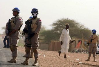 Indonesian peacekeepers from the UNAMID stand guard at ZamZam camp for internally displaced people in Al Fasher, northern Darfur April 13, 2010. (Reuters)