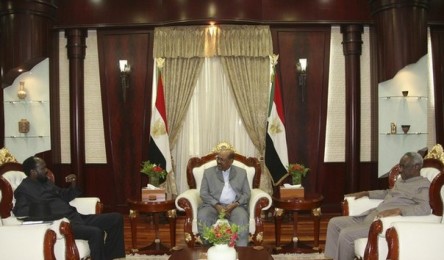 President  Al-Bashir. (C) talks to First Vice President Salva Kiir (L) and Vice President Ali Osman Taha during a meeting at the presidential palace to discuss referendum issues in Khartoum October 26, 2010 (Reuters)