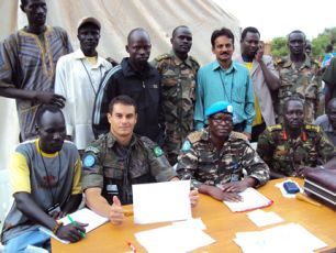 The joint DDR verification team (SSDDRC, SPLA, and UNMOS) with SPLA security officers and UNDDRU staff on the final day at demobilisation site in Rumbek, Lakes State. (Photo GOSS-online)