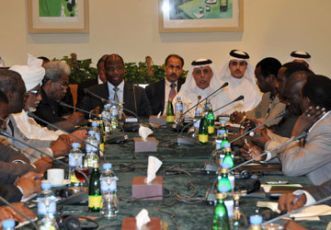 AU-UN mediator for Darfur Djibril Bassole (L) and Qatar's state FM Ahmed bin Abdullah al-Mahmud, at a meeting with Sudanese and LJM delegations in Doha October 5, 2010. (QNA)