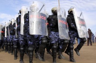 Police trainees demonstrate crowd control techniques and other skills during a visit of the United Nations (UN) Security Council at a UN-run training camp in the southern Sudanese town of Rejaf October 7, 2010 (Reuters)