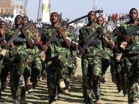 Sudanese PDF soldiers march during a ceremony for the 18th anniversary of the national Popular Defence Forces in Madani Nov 17, 2007 (AFP)