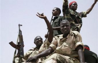 Sudanese soldiers participate in a state-orchestrated rally in the capital Khartoum, Wednesday, May 14, 2008