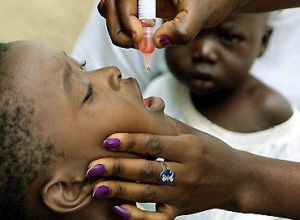 A medical worker vaccinates a child against polio. (AFP)