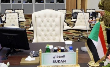 The empty chair of Sudanese President Omar al-Beshir is seen during the opening session of the 3rd Africa-EU summit in the Libyan capital Tripoli on November 29, 2010 (AFP)