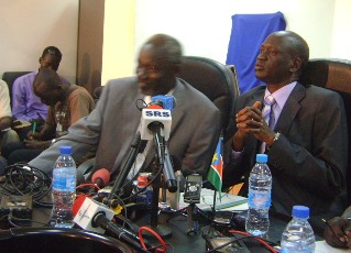 Garang Diing, the GoSS Energy an Mining Minister (R) and his undersecretary addressing journalists at the media forum on Tuesday, November 9, 2010 (ST)