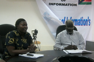 Lorna Merekaje, SuDEMOP's Secretary General (L) flanked by Isaac Kenyi, who heads the civil society referendum task force addressing the press in Juba, October 04, 2010 (ST)