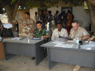 UN personnel working on documentation for DDR candidates in Al-Damazin town, February 23, 2009 (www.comfec.forces.gc.ca)
