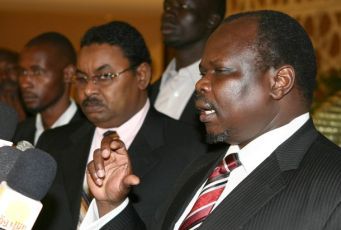 Salah Gosh (L), senior NCP member and presidential security adviser, and Pagan Amum (R) the secretary general of the former rebel Sudan People's Liberation Movement (SPLM), speaking in a press conference in the capital Khartoum, on August 30, 2010 (Getty Images)