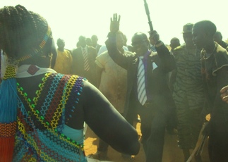 James Wani Igga, the SSLA speaker (holding a stick) addresses voters during his tour in Torit, the Eastern Equatoria State capital, December 06, 2010 (Photo Ijjo Bosco)