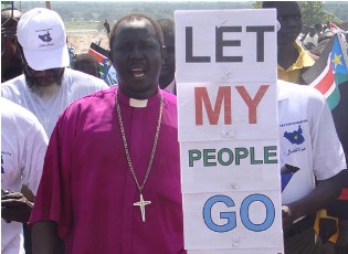 A cleric joins a peaceful pro-separation rally organized by the coalition for civil society organizations in Juba. Sept 9, 2010 (ST)