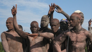 Mundari youth celebrates after wrestling match in Juba. Nov. 2010 (Photo: Ayuen Panchol, Sudan Radio Services)