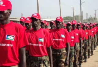 Organized forces including the Sudan People’s Liberation Army (SPLA), Joint Integrated Units (JIU) and police march in in Bor town, Jonglei state, on World Aids Day. Dec. 1, 2010 (ST)
