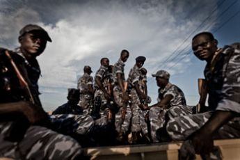 SPLA soldiers ride in the back of a pick-up in Abyei (Enough-Tim Freccia)