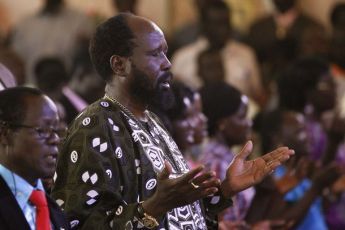 South Sudan's President Salva Kiir prays during the Christmas mass in St. Teresa's Cathedral in Juba, December 25, 2010. (Reuters)