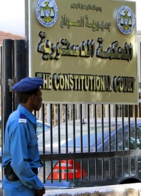A policeman stands guard after a group of lawyers delivered. papers to the constitutional court as part of their legal bid to halt a referendum on southern Sudanese independence, in Khartoum December 12, 2010 (Reuters)