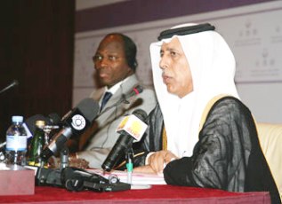 State minister Al-Mahmoud (L) and JCM Bassole (QNA)