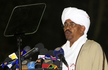 Sudan's President Omar Hassan al-Bashir addresses the nation during celebrations for the 55th anniversary of Sudan's independence at the Palace in Khartoum December 31, 2010 (Reuters)