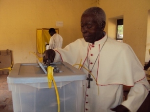 Bishop_emeritus_of_the_Catholic_Dioecese_of_Tombura-Yambio_Joseph_Gasi_Abangite_83_casts_his_vote_at_Hai_Pazuo_polling_centre_Jan_9_2011.jpg